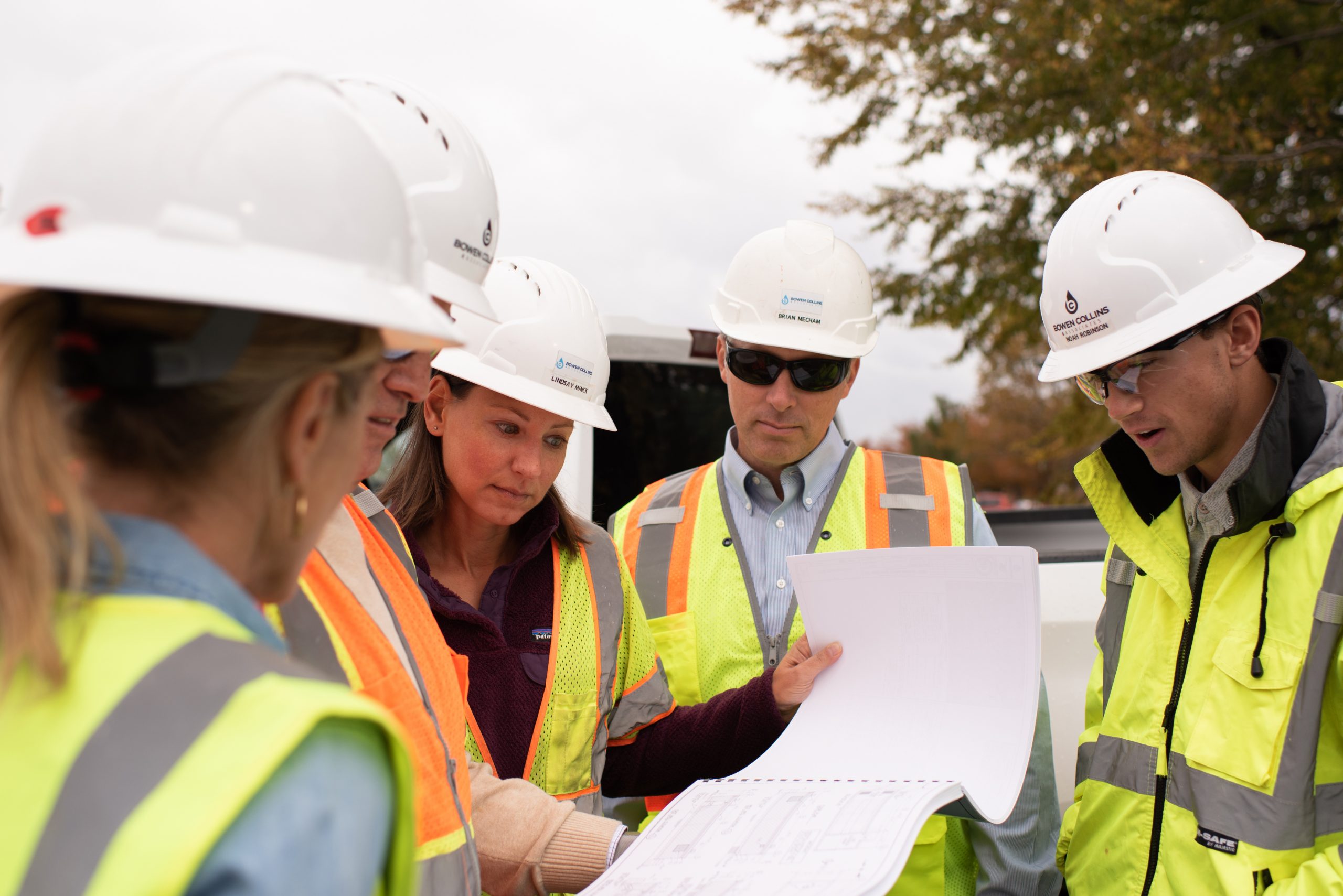 Construction workers discussing documents